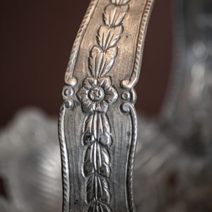 Pormenor de coroa em prata. Século XIX.
